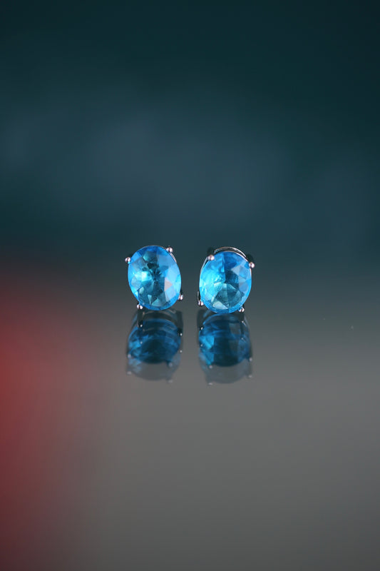 Aretes de zirconios ovalados azul arrecife