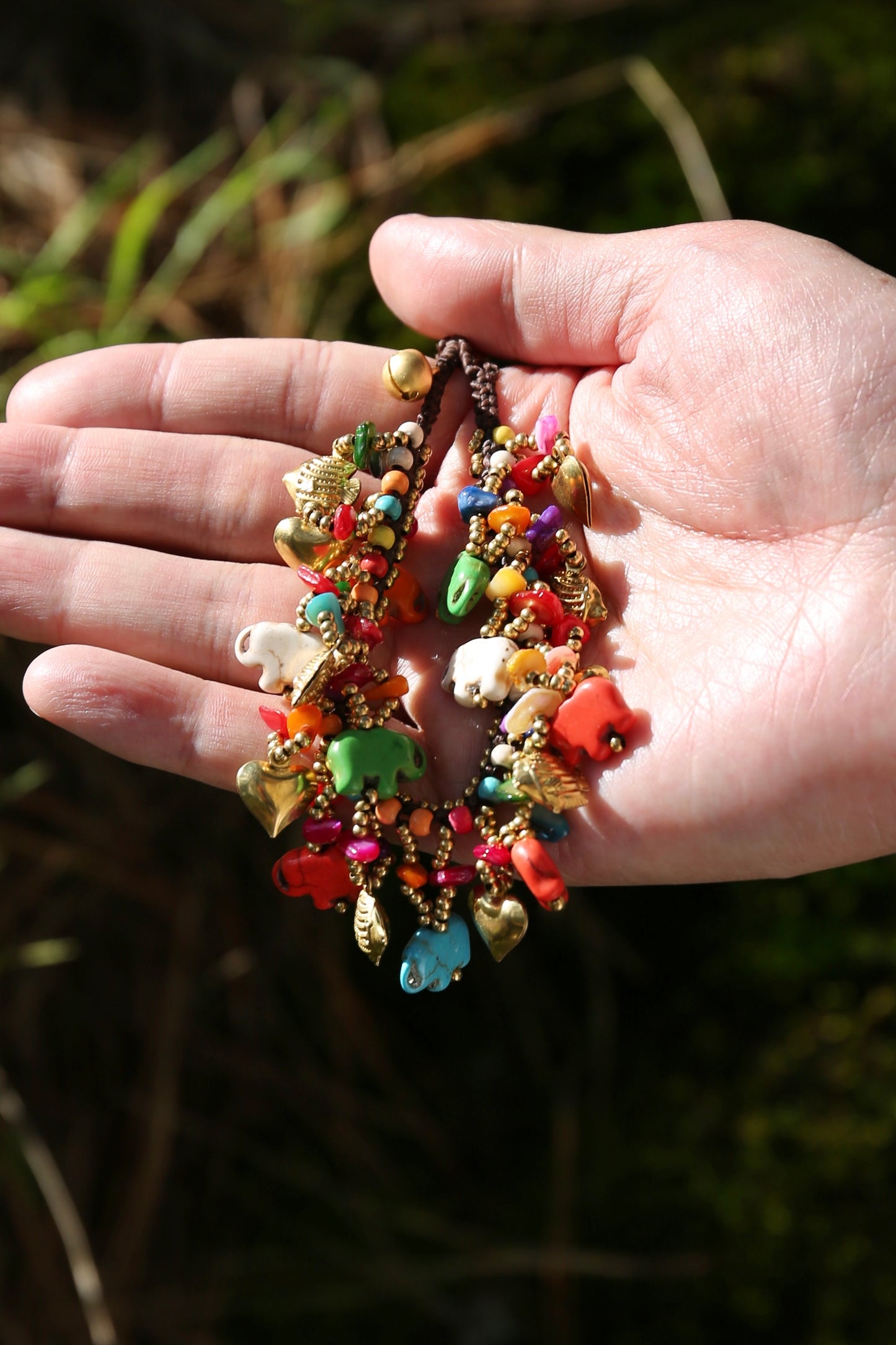 Pulsera de campana y elefantes de colores tejida a mano