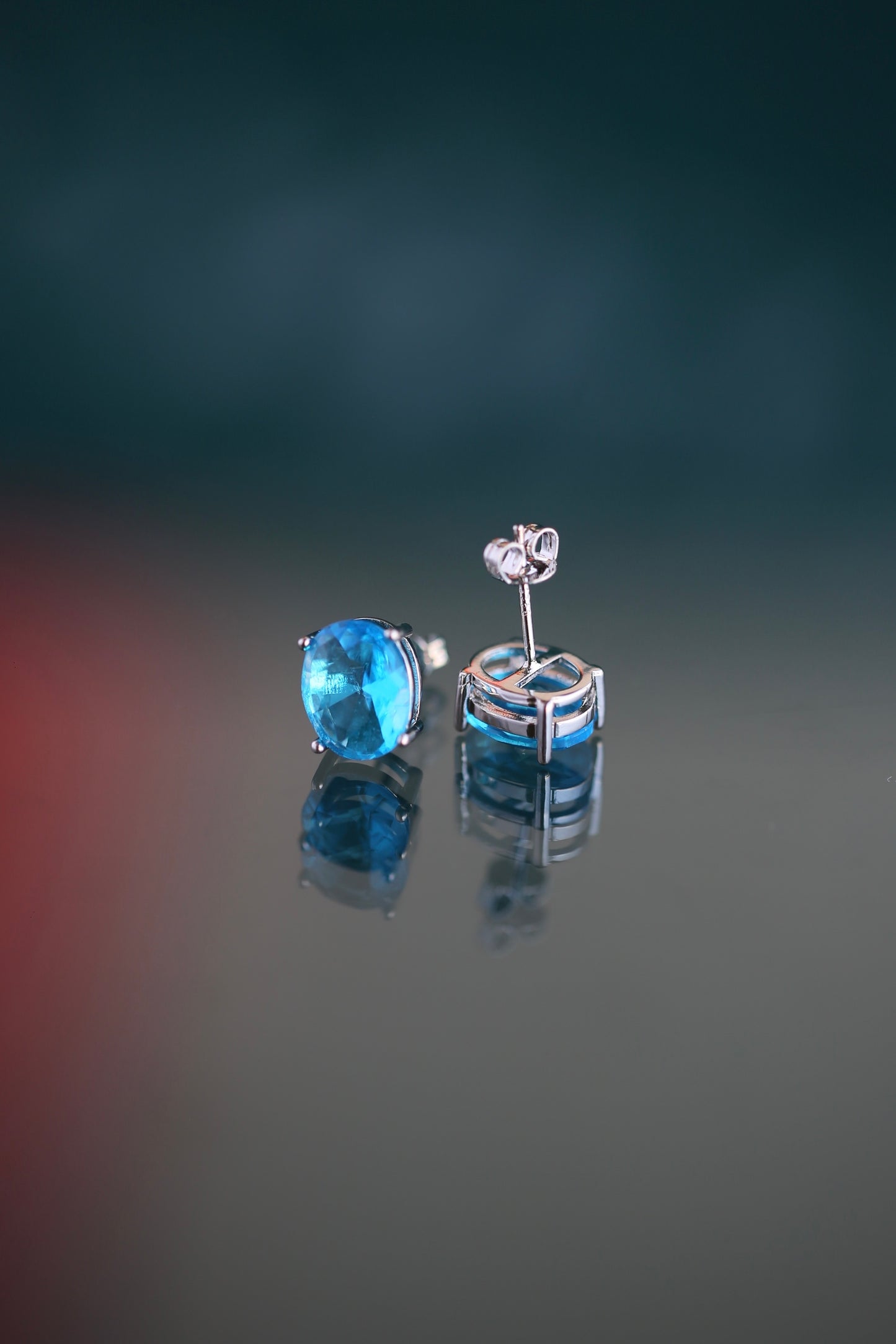 Aretes de zirconios ovalados azul arrecife